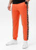 Spodnie sportowe PIT BULL Tricot Terry TAPE NUGGET bright salmon