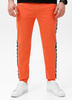 Spodnie sportowe PIT BULL Tricot Terry TAPE NUGGET bright salmon