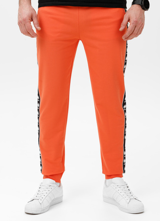 Spodnie sportowe PIT BULL Tricot Terry TAPE NUGGET bright salmon