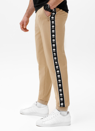 Spodnie sportowe PIT BULL Tricot Terry TAPE NUGGET beżowe (pale sand)
