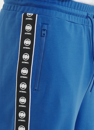Spodnie sportowe PIT BULL Tricot Terry TAPE NUGGET niebieskie (electric blue)