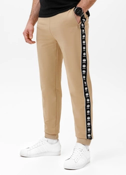 Spodnie sportowe PIT BULL Tricot Terry TAPE NUGGET beżowe (pale sand)