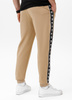 Spodnie sportowe PIT BULL Tricot Terry TAPE NUGGET beżowe (pale sand)
